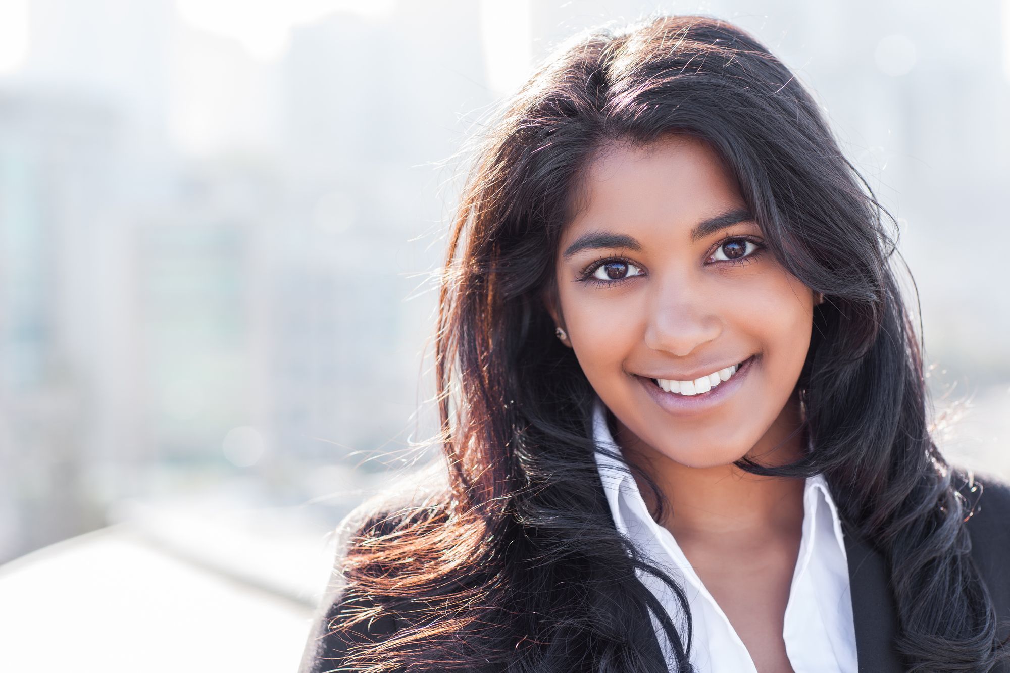 woman smiling with very white teeth