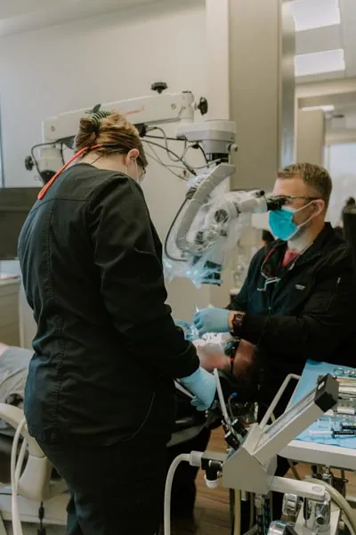 Dr. Jeffery Allred providing oral surgery care to a patient at Allred Dental
